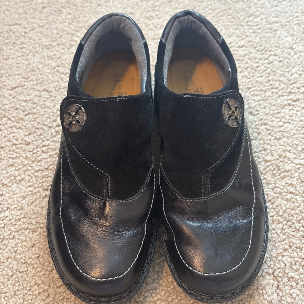 Naot Black Leather Mules with Button Detail